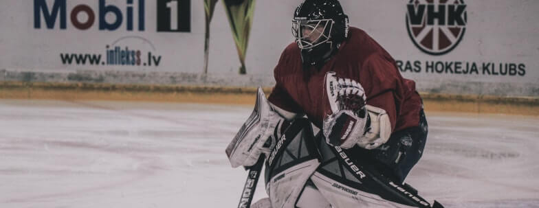 Do Hockey Goalies Catch with Their Dominant Hand?